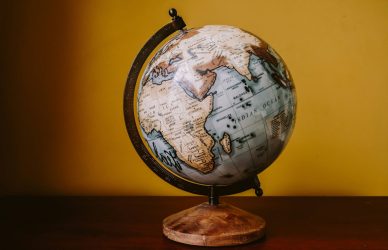 white and brown desk globe