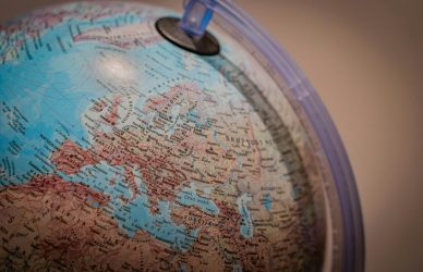 blue and white globe with blue plastic frame